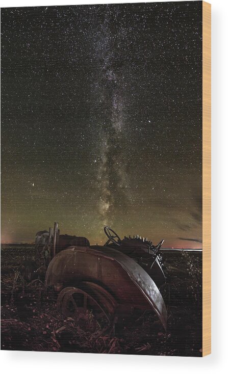 Milky Way Stars Astronomy Astroscape Nightscape Galaxy Tractor Abandoned Vintage Case John Deere Antique Rust Corn Field Stubble Scenic Landscape Horizontal Metal Steampunk North Dakota Nd Rural Ag Agriculture Farming  Wood Print featuring the photograph Abandoned Tractor headed towards Milky Way by Peter Herman