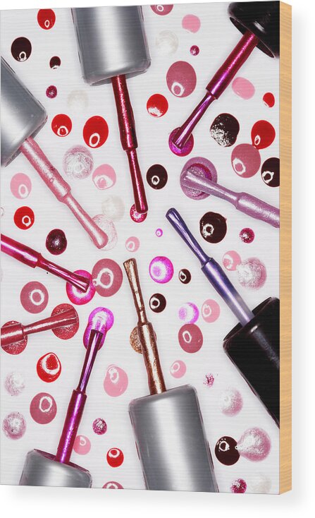 White Background Wood Print featuring the photograph Assorted Nail Varnish Lids With Brushes by Martin Poole