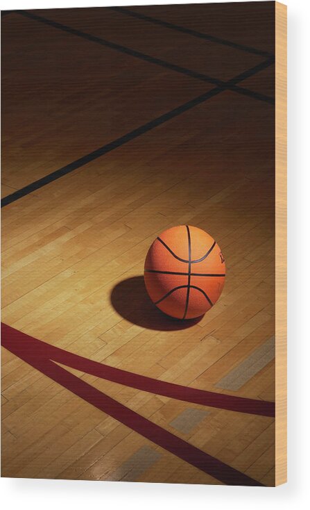 Orange Color Wood Print featuring the photograph Basketball On Basketball Court by Thomas Northcut