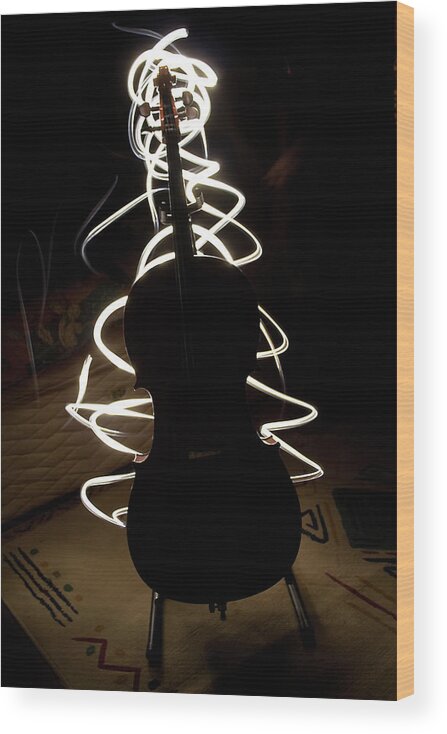Music Wood Print featuring the photograph Cello By Torchlight by Photo By Anthony Thomas