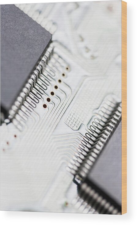 Electrical Component Wood Print featuring the photograph Close-up Of A Circuit Board by Nicholas Rigg