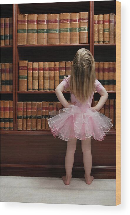 Education Wood Print featuring the photograph Little Girl In Tutu Reading Book Covers by Compassionate Eye Foundation/barry Calhoun