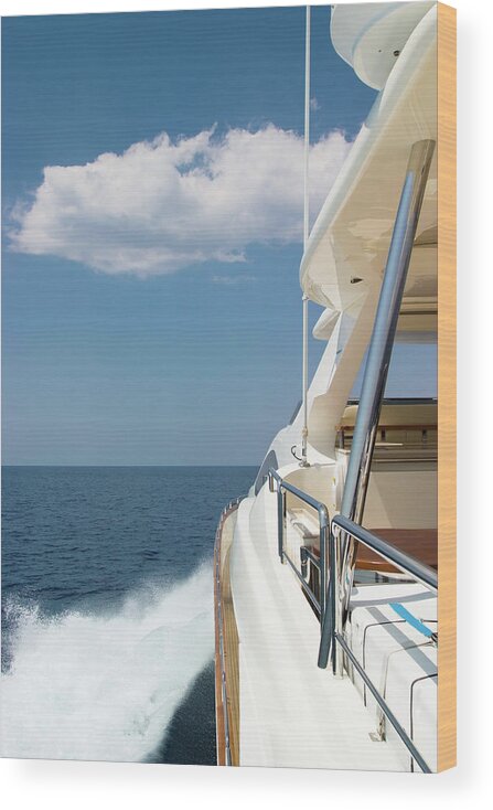 Motorboat Wood Print featuring the photograph Luxury Yacht Sailing At High Speed by Petreplesea