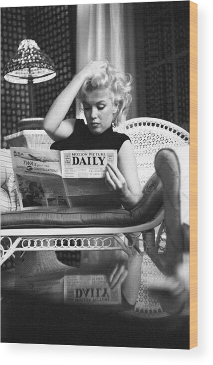 Marilyn Monroe Wood Print featuring the photograph Marilyn Relaxes In A Hotel Room by Michael Ochs Archives