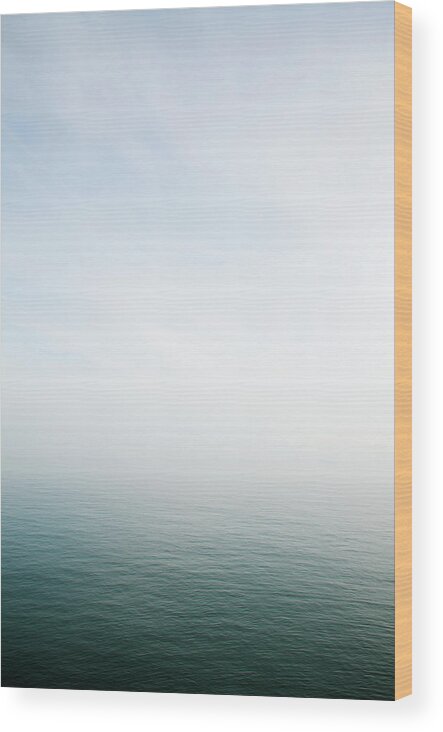 Scenics Wood Print featuring the photograph Misty Sea Horizon Background by Peskymonkey