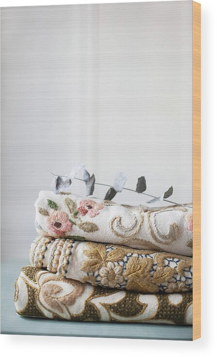 Ip_13694024 Wood Print featuring the photograph Neat Pile Of Embroidered Tablecloths by Alicja Koll