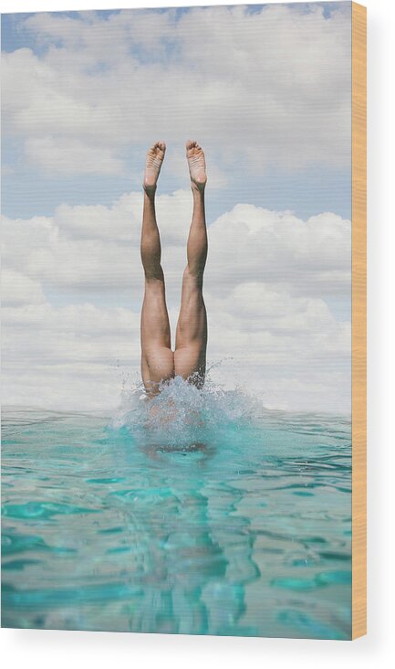 Diving Into Water Wood Print featuring the photograph Nude Man Diving by Ed Freeman