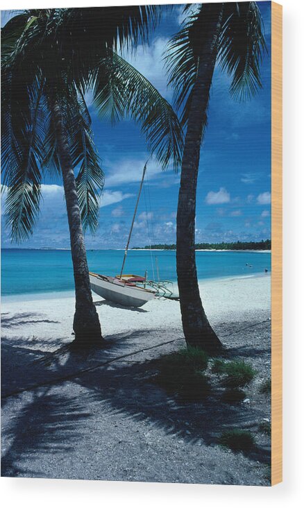 Shadow Wood Print featuring the photograph Outrigger Canoe On A Palm-fringed by Oliver Strewe