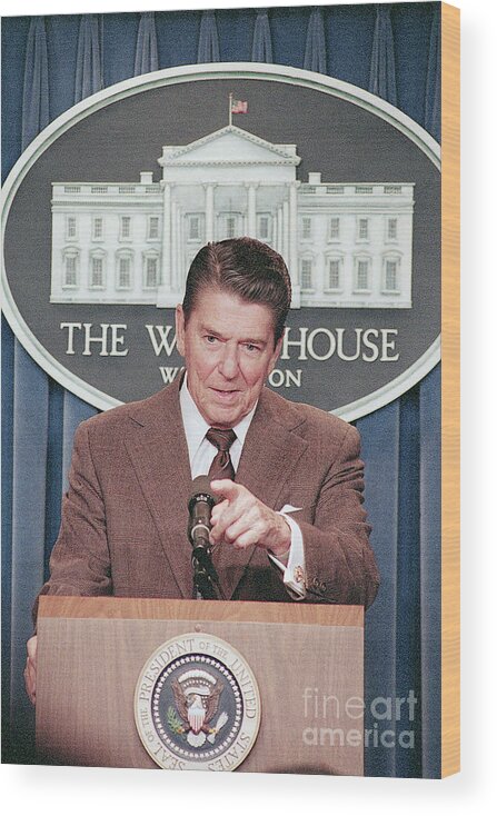 1980-1989 Wood Print featuring the photograph President Ronald Reagan At A Press by Bettmann