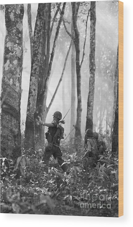 Vietnam War Wood Print featuring the photograph Soldier Throwing Hand Grenade by Bettmann