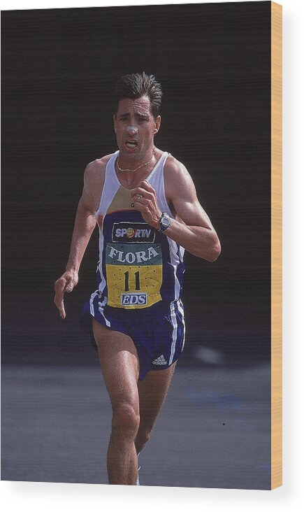 Track Event Wood Print featuring the photograph Antonio Pinto #1 by Stu Forster