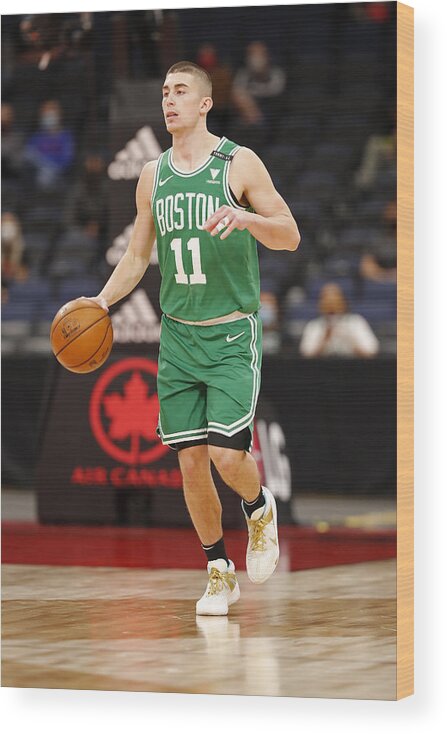 Nba Pro Basketball Wood Print featuring the photograph Boston Celtics v Toronto Raptors by Scott Audette