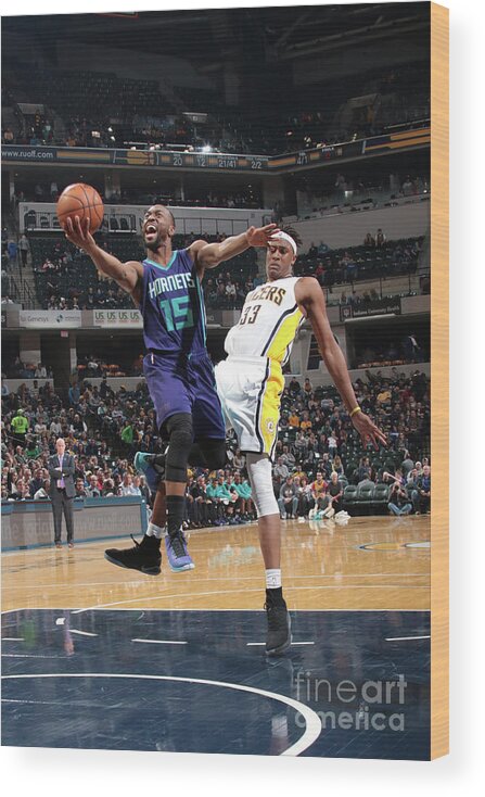 Kemba Walker Wood Print featuring the photograph Kemba Walker by Ron Hoskins