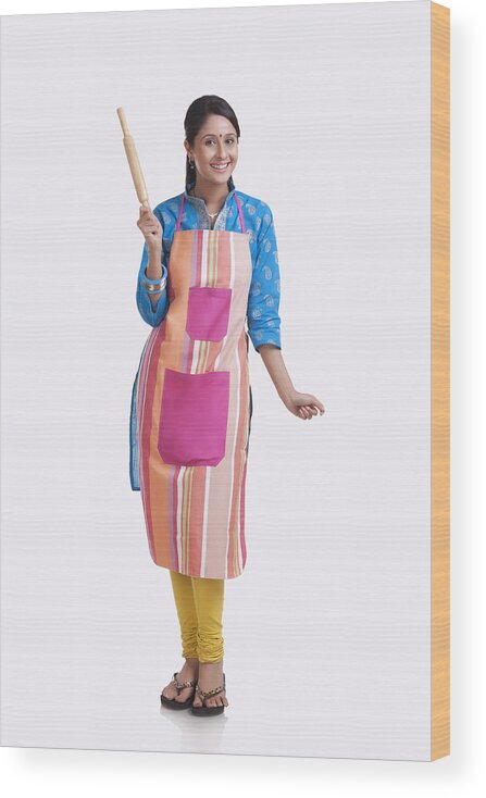 Homemaker Wood Print featuring the photograph Portrait of a young WOMEN wearing an apron #1 by Sudipta Halder