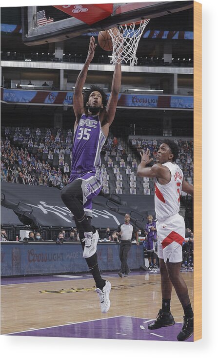 Nba Pro Basketball Wood Print featuring the photograph Toronto Raptors v Sacramento Kings by Rocky Widner