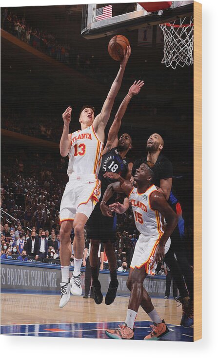 Bogdan Bogdanovic Wood Print featuring the photograph 2021 NBA Playoffs - Atlanta Hawks v New York Knicks by Nathaniel S. Butler