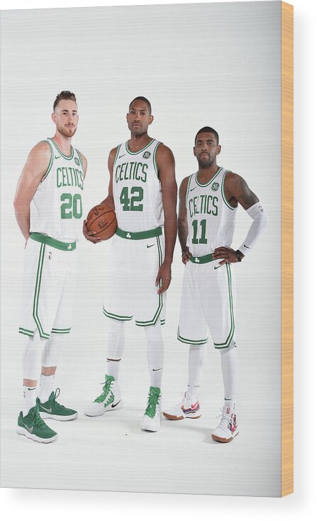 Media Day Wood Print featuring the photograph Al Horford, Kyrie Irving, and Gordon Hayward by Brian Babineau