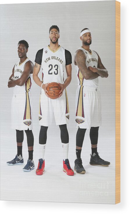 Jrue Holiday Wood Print featuring the photograph Demarcus Cousins, Jrue Holiday, and Anthony Davis by Layne Murdoch