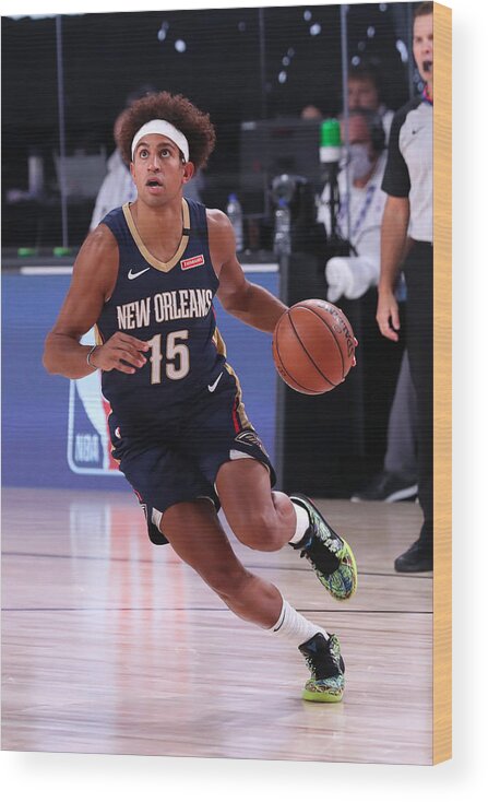 Frank Jackson Wood Print featuring the photograph New Orleans Pelicans v Brooklyn Nets #2 by Joe Murphy