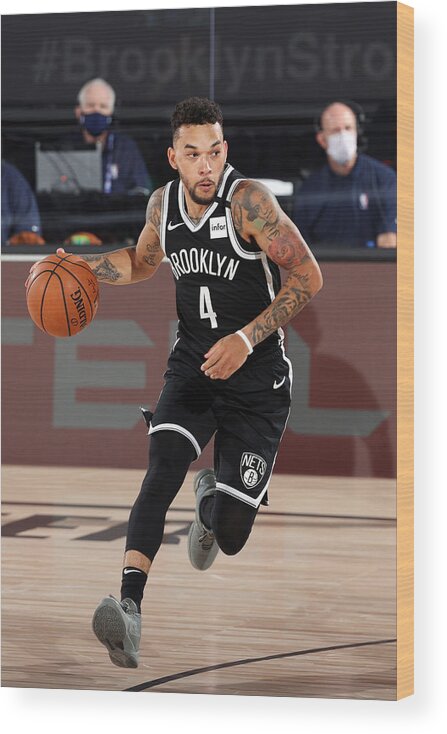 Chris Chiozza Wood Print featuring the photograph Sacramento Kings v Brooklyn Nets #2 by David Sherman