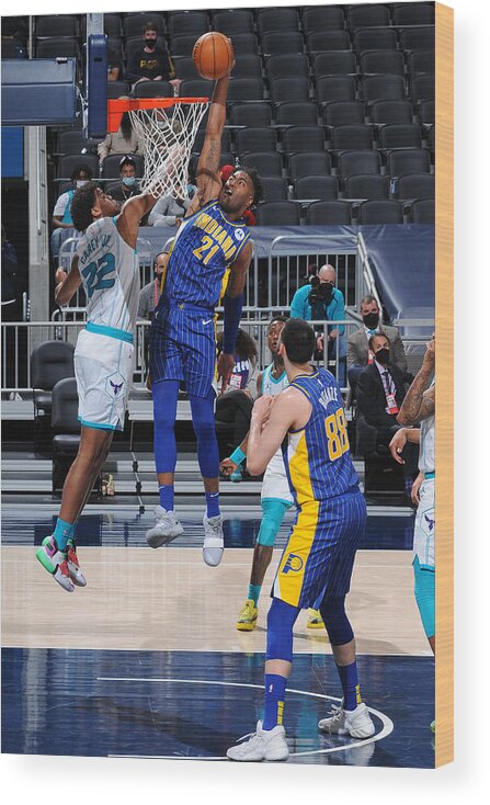 Kelan Martin Wood Print featuring the photograph Play-In Tournament - Charlotte Hornets v Indiana Pacers by Ron Hoskins