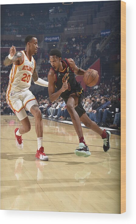 Evan Mobley Wood Print featuring the photograph Atlanta Hawks v Cleveland Cavaliers by David Liam Kyle