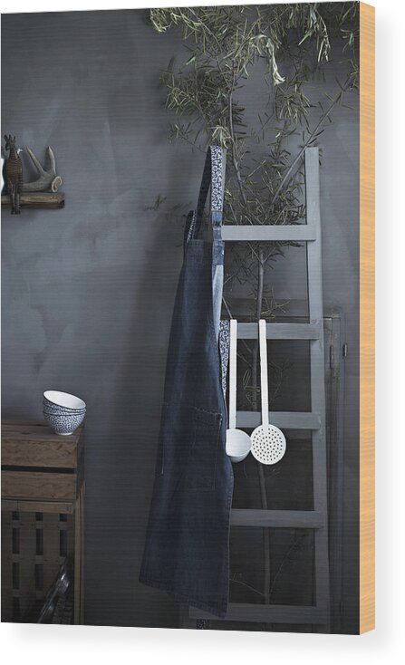 Apron Wood Print featuring the photograph A rustic vintage kitchen with bowls, apron and utensils on a gray background by The Picture Pantry