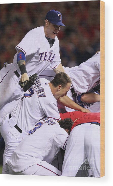 Playoffs Wood Print featuring the photograph Andres Blanco, Josh Hamilton, and David Murphy by Stephen Dunn