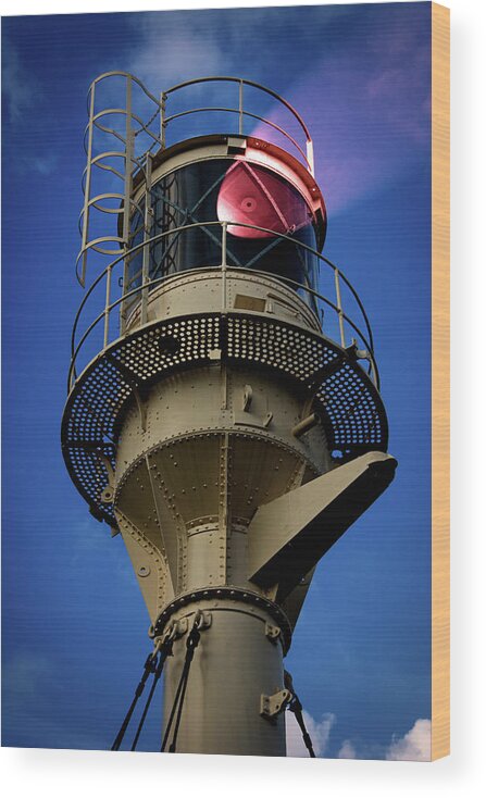 Lighthouse Wood Print featuring the photograph Beam of light from a lighthouse. by Bernhard Schaffer