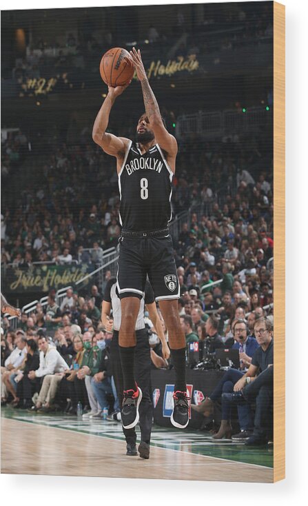 Patty Mills Wood Print featuring the photograph Brooklyn Nets v Milwaukee Bucks by Gary Dineen