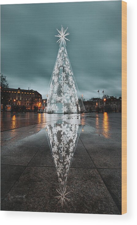 Sightseeing Wood Print featuring the photograph Christmas Vilnius under dramatic skies by Vaclav Sonnek