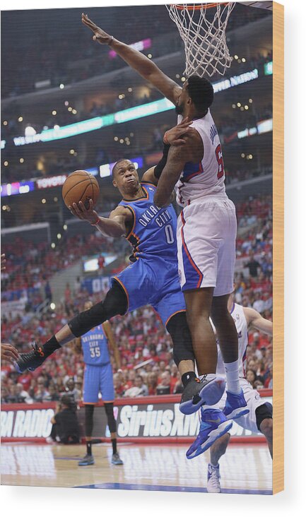 Russell Westbrook Wood Print featuring the photograph Deandre Jordan and Russell Westbrook by Stephen Dunn