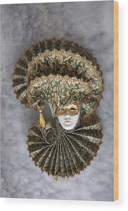 Art Wood Print featuring the photograph Decorative Venetian mask on gray tableto. by Emreturanphoto