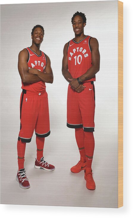 Kyle Lowry Wood Print featuring the photograph Demar Derozan and Kyle Lowry by Ron Turenne