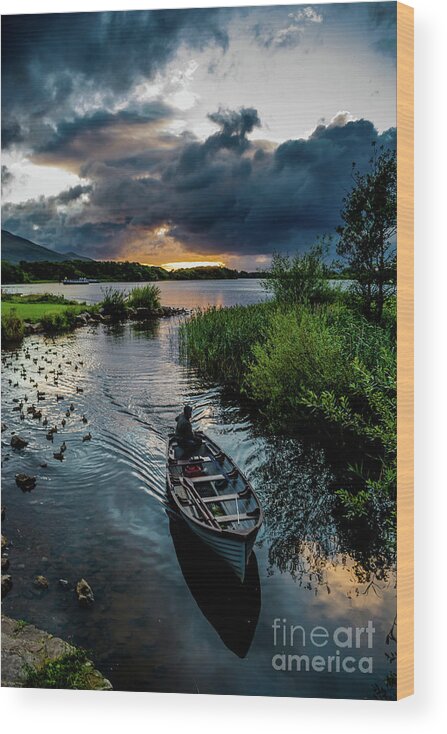 Ireland Wood Print featuring the photograph Fisher boat returns at sunset from Lough Leane in Killarney National Park in Ireland by Andreas Berthold