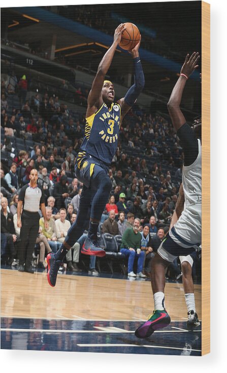 Aaron Holiday Wood Print featuring the photograph Indiana Pacers v Minnesota Timberwolves by David Sherman