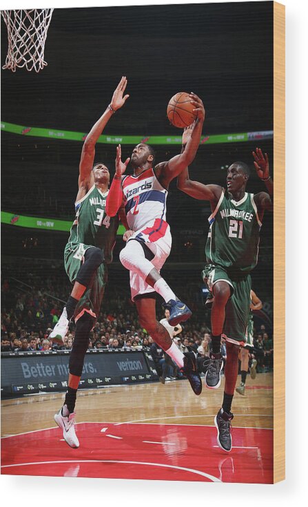 Nba Pro Basketball Wood Print featuring the photograph John Wall and Giannis Antetokounmpo by Ned Dishman