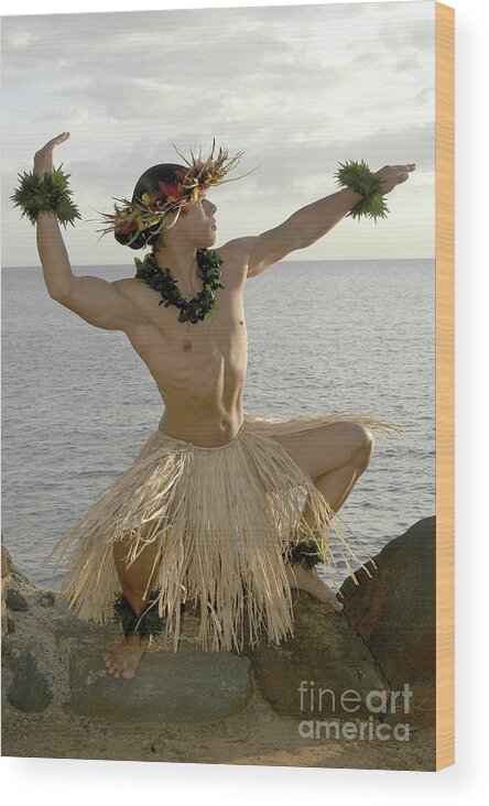 Beach Wood Print featuring the photograph Male Hula Dancer poses on the beach in a traditional sun worship move. by Gunther Allen