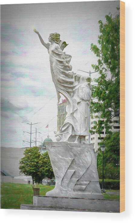 Mississippi River Walk Wood Print featuring the photograph Monument To The Immigrant - NOLA Riverwalk by Debra Martz