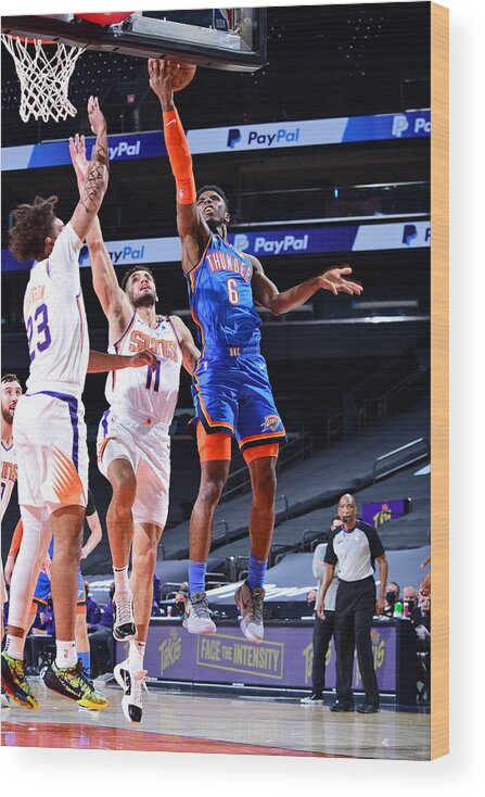 Nba Pro Basketball Wood Print featuring the photograph Oklahoma City Thunder v Phoenix Suns by Michael Gonzales