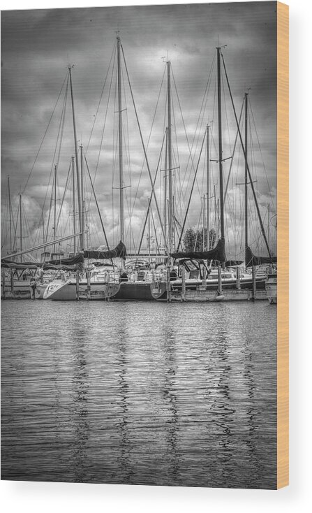 Boats Wood Print featuring the photograph Reflections and Boats at the Harbor in Black and White by Debra and Dave Vanderlaan