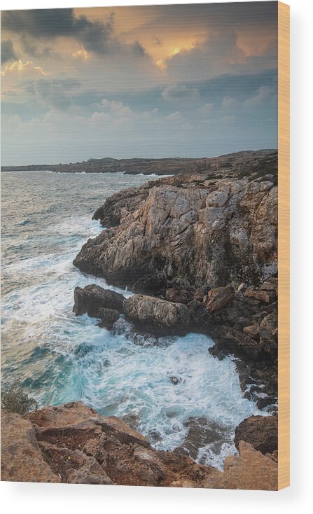 Stormy Sea Wood Print featuring the photograph Seascape with windy waves during stormy weather at sunset. by Michalakis Ppalis