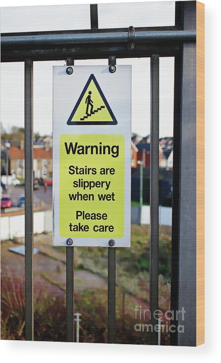 Accident Wood Print featuring the photograph Slippery when wet sign by Tom Gowanlock