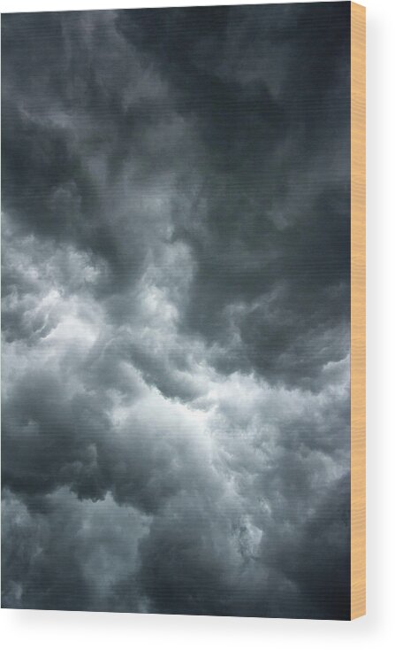 Clouds Wood Print featuring the photograph Stormy clouds in the sky. by Bernhard Schaffer
