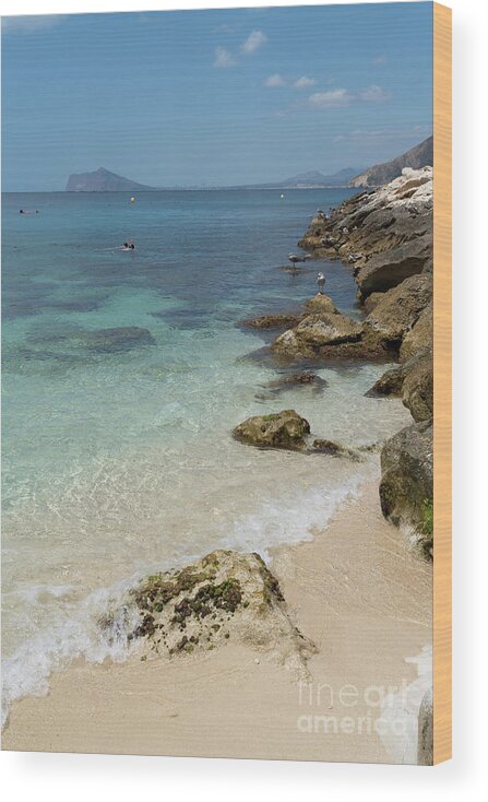 Mediterranean Wood Print featuring the photograph Turquoise blue sea water and rocks in Calpe 3 by Adriana Mueller
