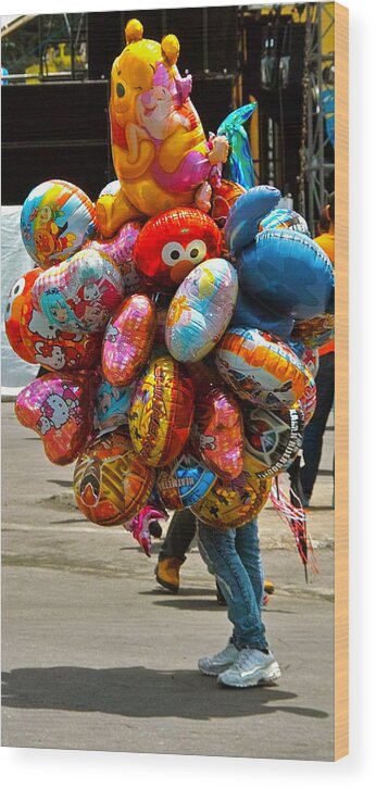 Balloon Wood Print featuring the photograph The Balloon Lady by Jocelyn Kahawai