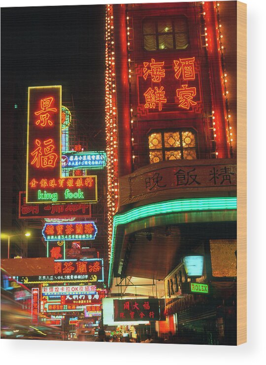 Neon Sign Wood Print featuring the photograph Neon Signs In Hong Kong #1 by Simon Fraser/science Photo Library
