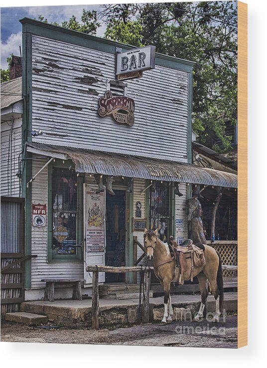 11th Street Cowboy Bar Wood Print featuring the photograph 11th Street Cowboy Bar in Bandera Texas by Priscilla Burgers