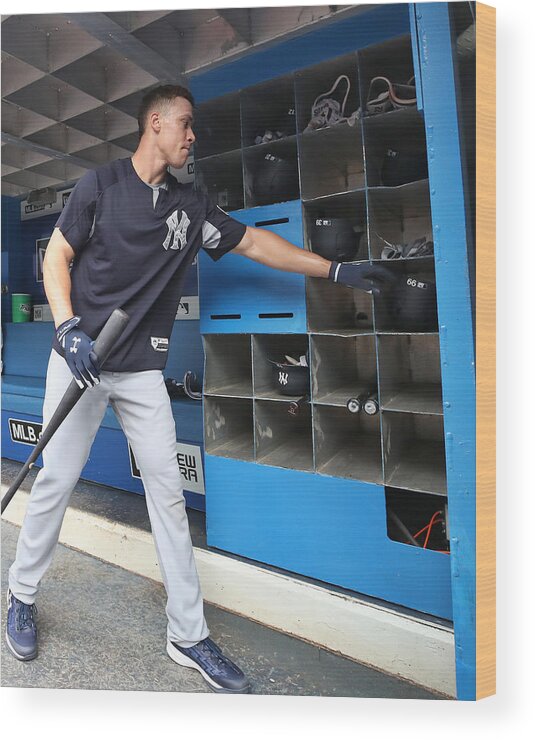 Headwear Wood Print featuring the photograph New York Yankees v Toronto Blue Jays by Tom Szczerbowski