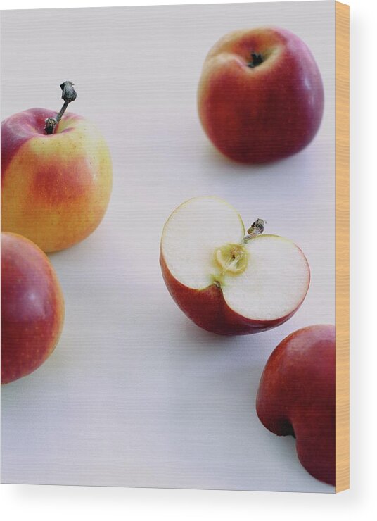 Fruits Wood Print featuring the photograph A Group Of Apples by Romulo Yanes